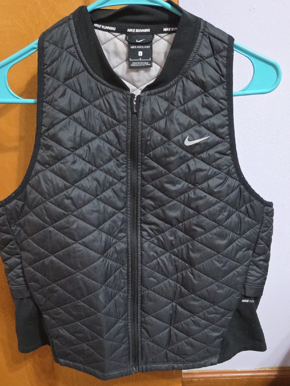 Nike Aerolayer Black Quilted Sleeveless Vest with Silver Swoosh Lightweight
